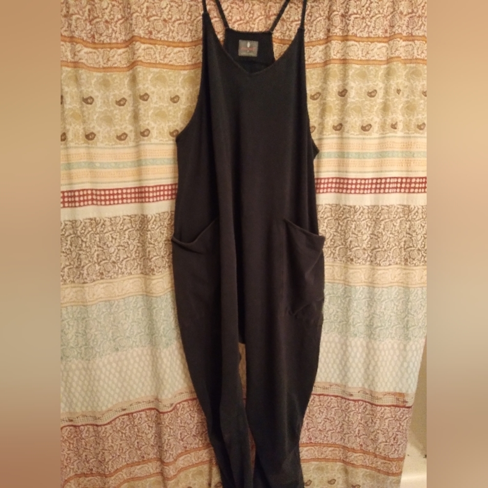 SOLD. FP Movement free people hot shot onesie M